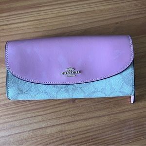 Coach signature wallet.